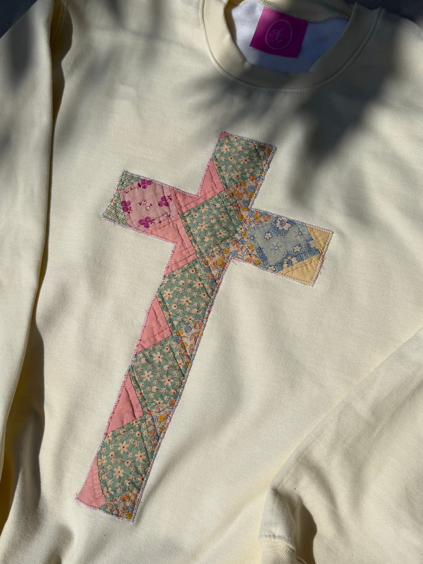 Small Quilted Cross Crewneck
